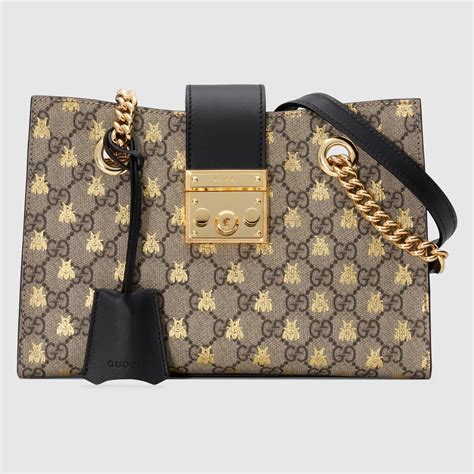 gucci borsa chiusura ape|Borsa Gucci Padlock GG supreme con api .